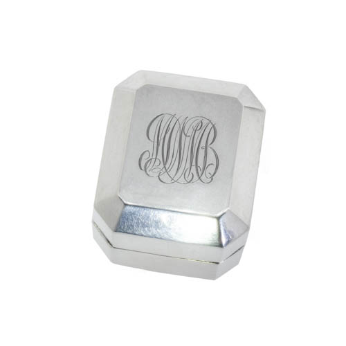 A square shaped, vintage sterling silver ring box with a monogram hand engraved on the top
